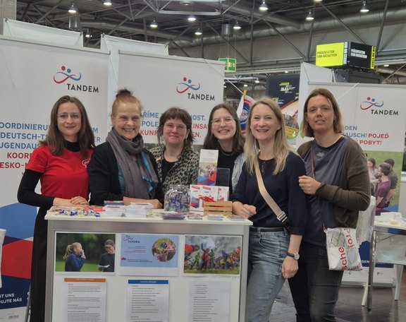 Belegschaft des Tandem-Messestandes